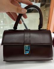 mini el çantası kahve